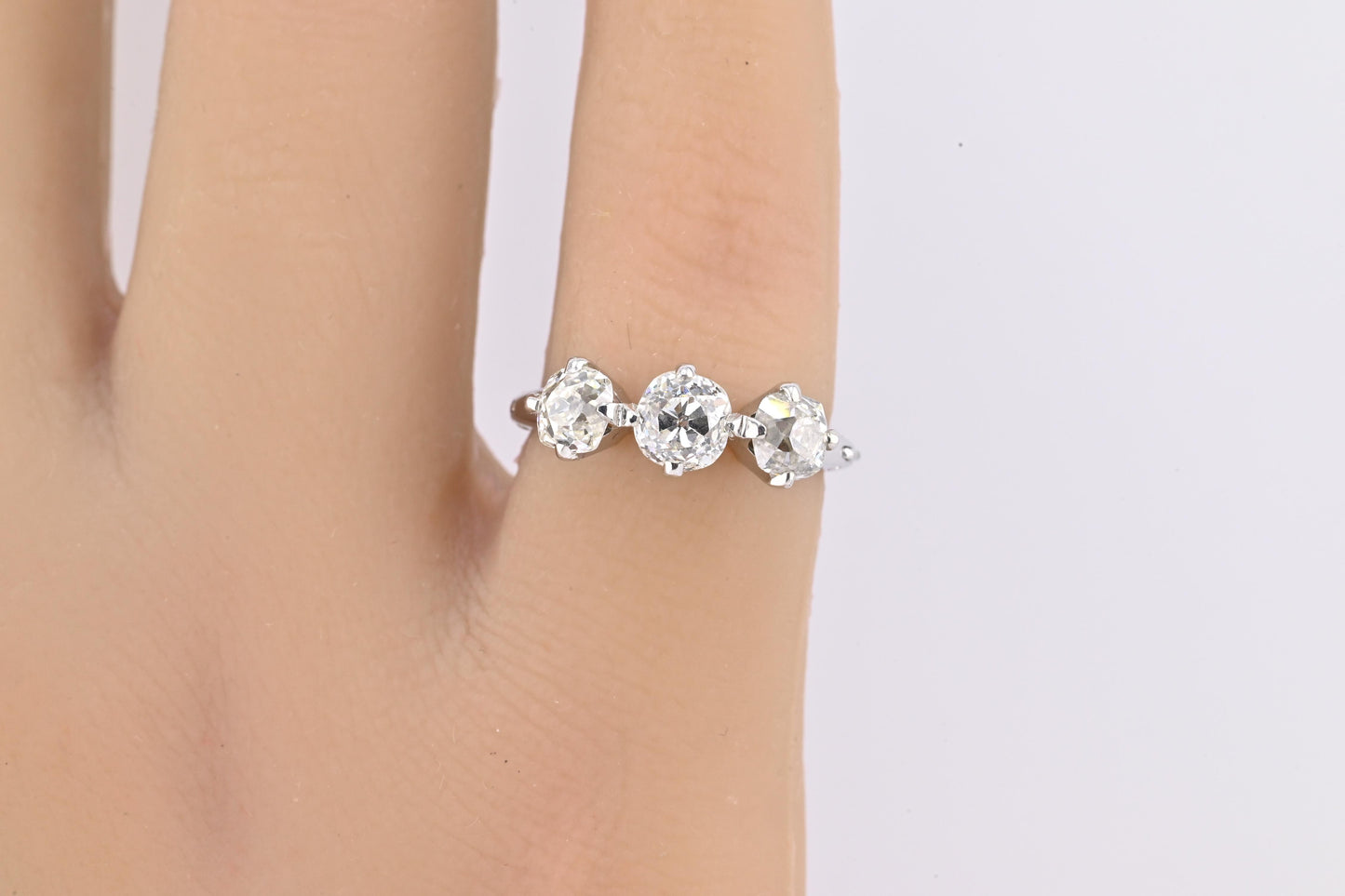 Edwardian 18K White Gold 3-Stone Diamond Ring 1.87 Carats Old Mine Cuts