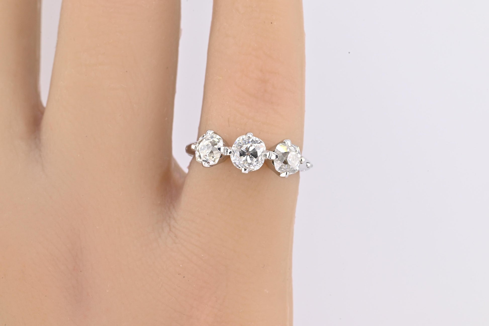 Edwardian 18K White Gold 3-Stone Diamond Ring 1.87 Carats Old Mine Cuts