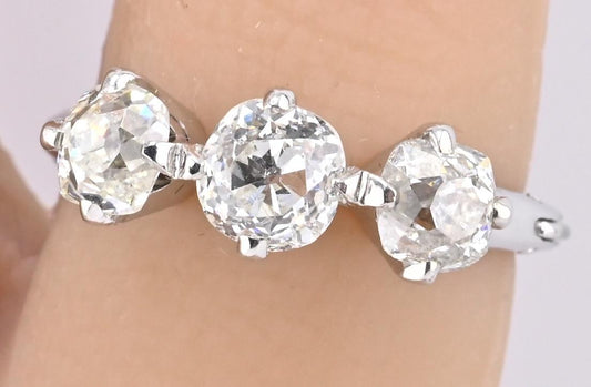 Edwardian 18K White Gold 3-Stone Diamond Ring 1.87 Carats Old Mine Cuts
