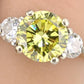 GIA Certified 1.99ct Fancy Intense Yellow Diamond Ring VS1, .50 ct Side Diamonds
