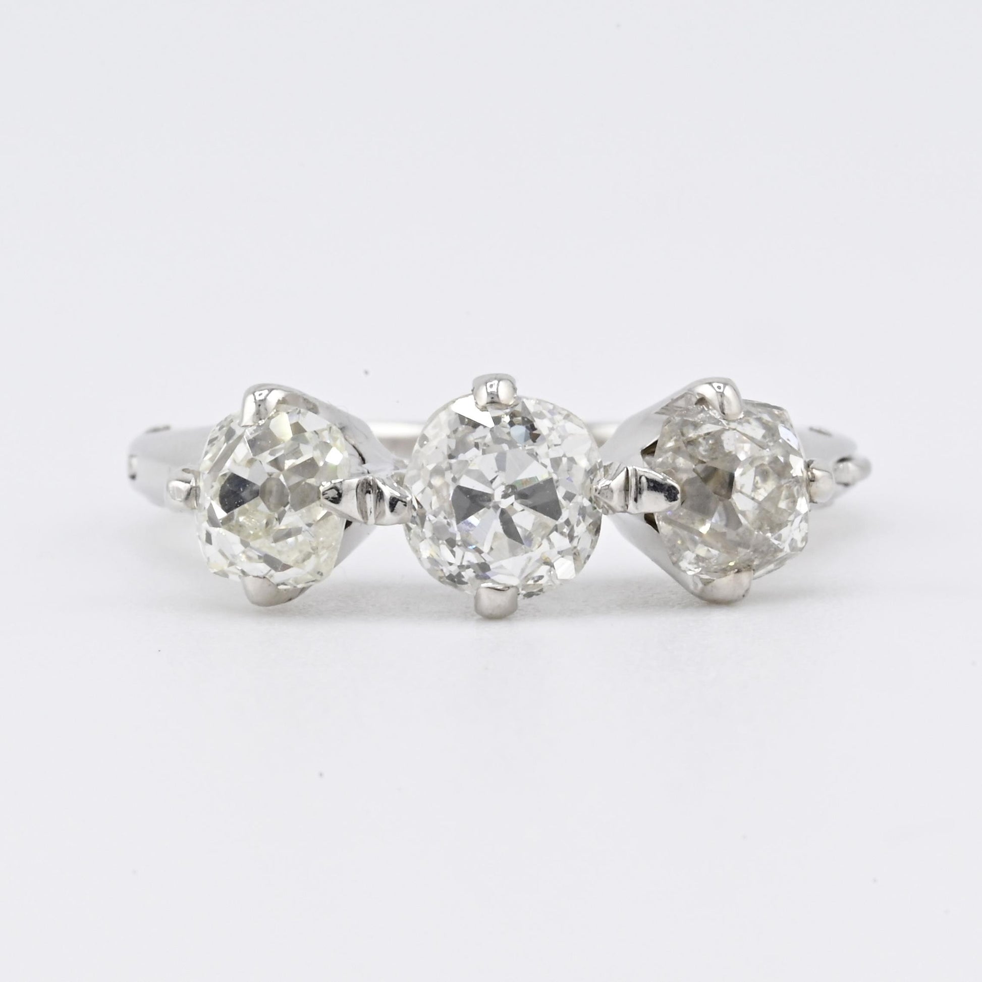 Edwardian 18K White Gold 3-Stone Diamond Ring 1.87 Carats Old Mine Cuts