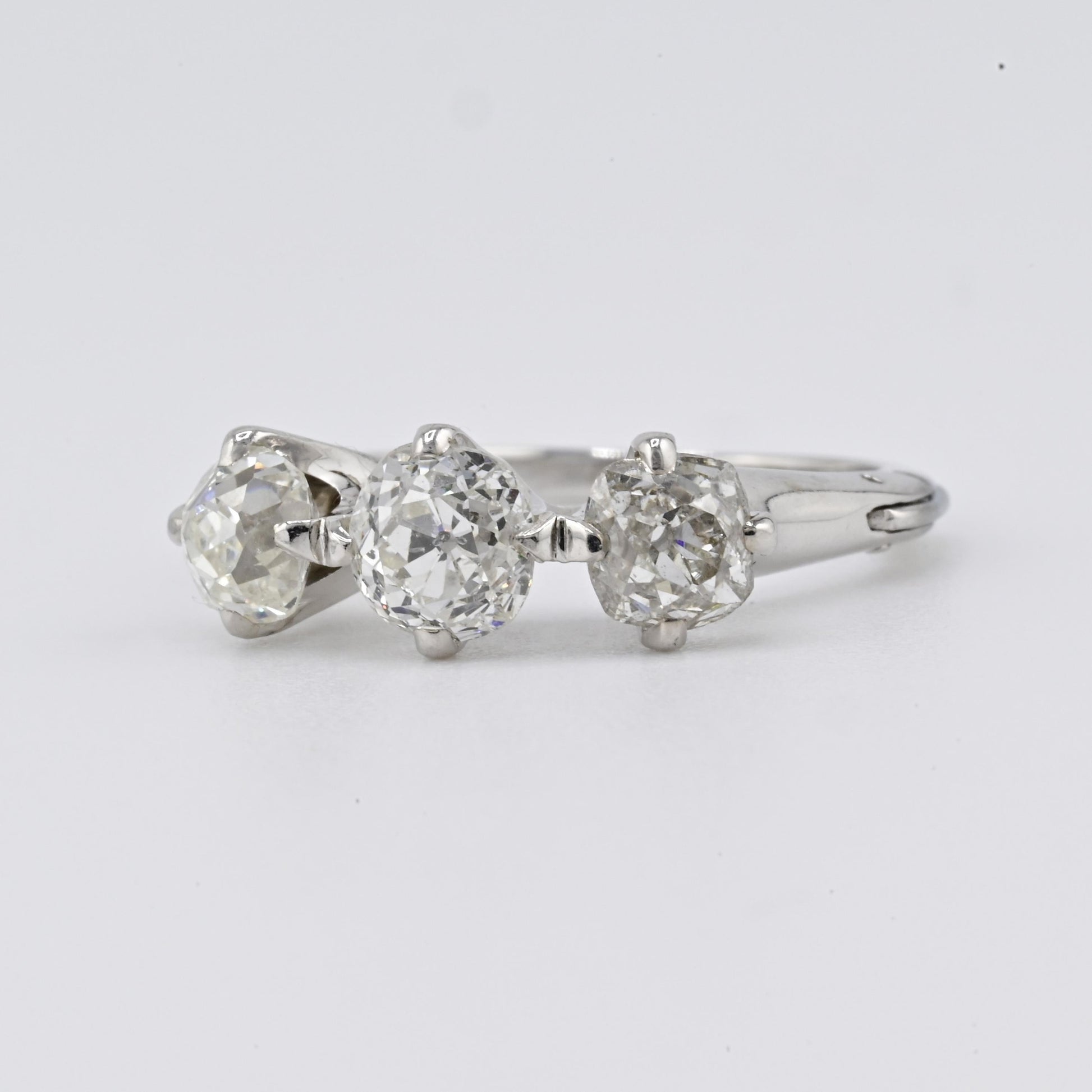 Edwardian 18K White Gold 3-Stone Diamond Ring 1.87 Carats Old Mine Cuts