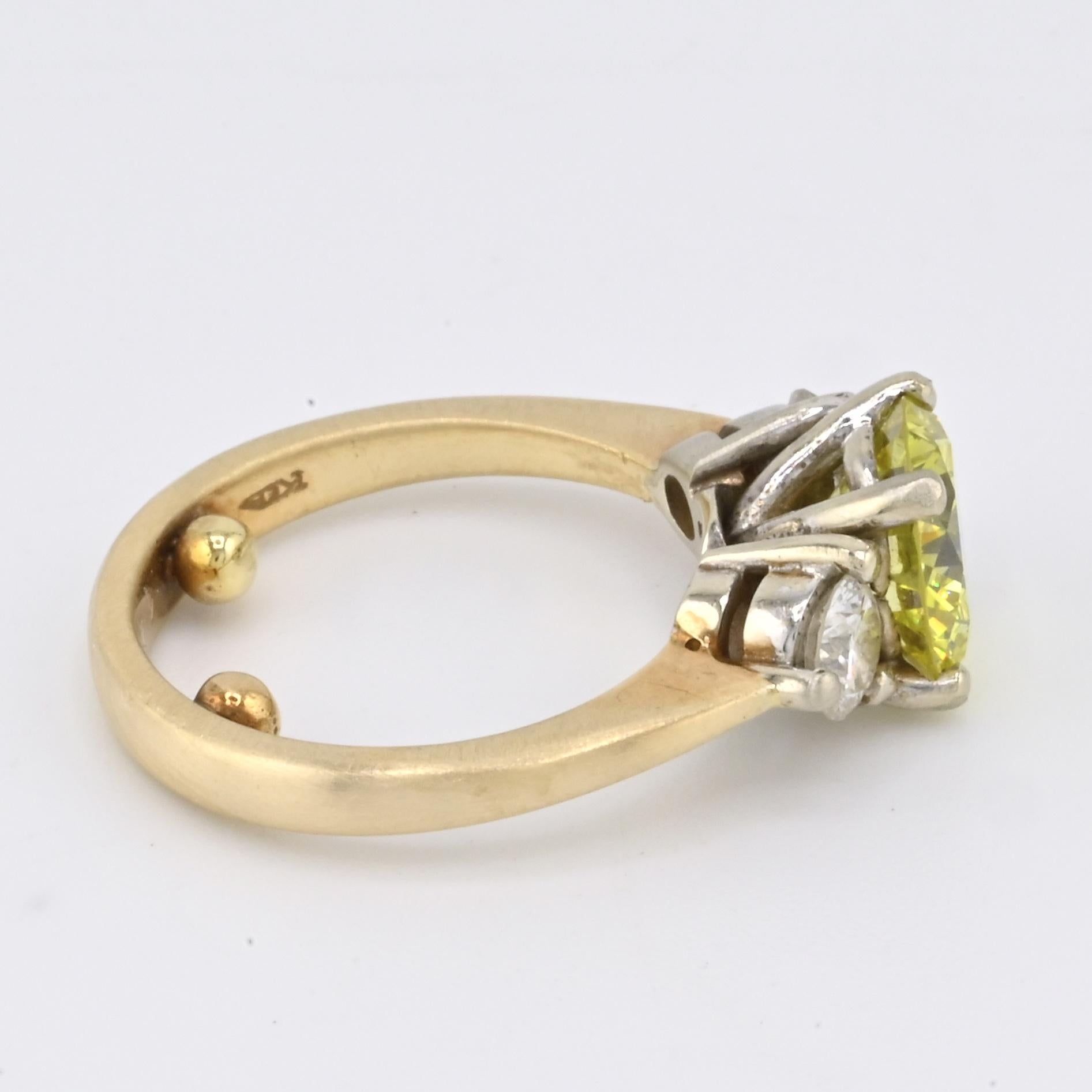 GIA Certified 1.99ct Fancy Intense Yellow Diamond Ring VS1, .50 ct Side Diamonds