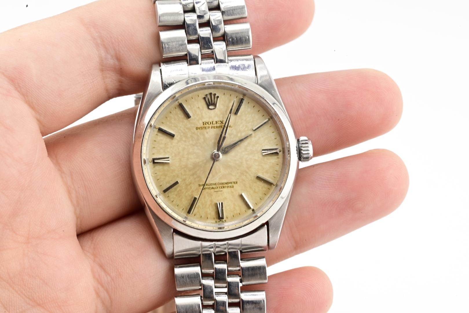 Rolex Oyster Perpetual 1002 Tropical Patina Dial Stainless Steel Automatic Watch