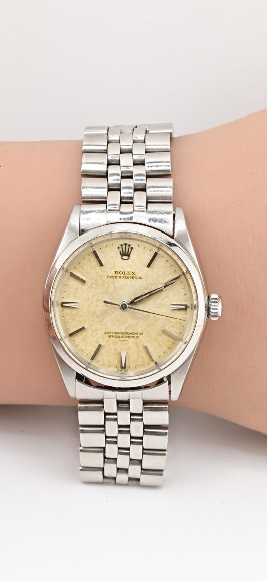 Rolex Oyster Perpetual 1002 Tropical Patina Dial Stainless Steel Automatic Watch