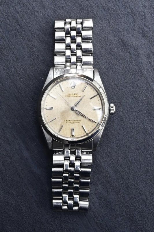 Rolex Oyster Perpetual 1002 Tropical Patina Dial Stainless Steel Automatic Watch