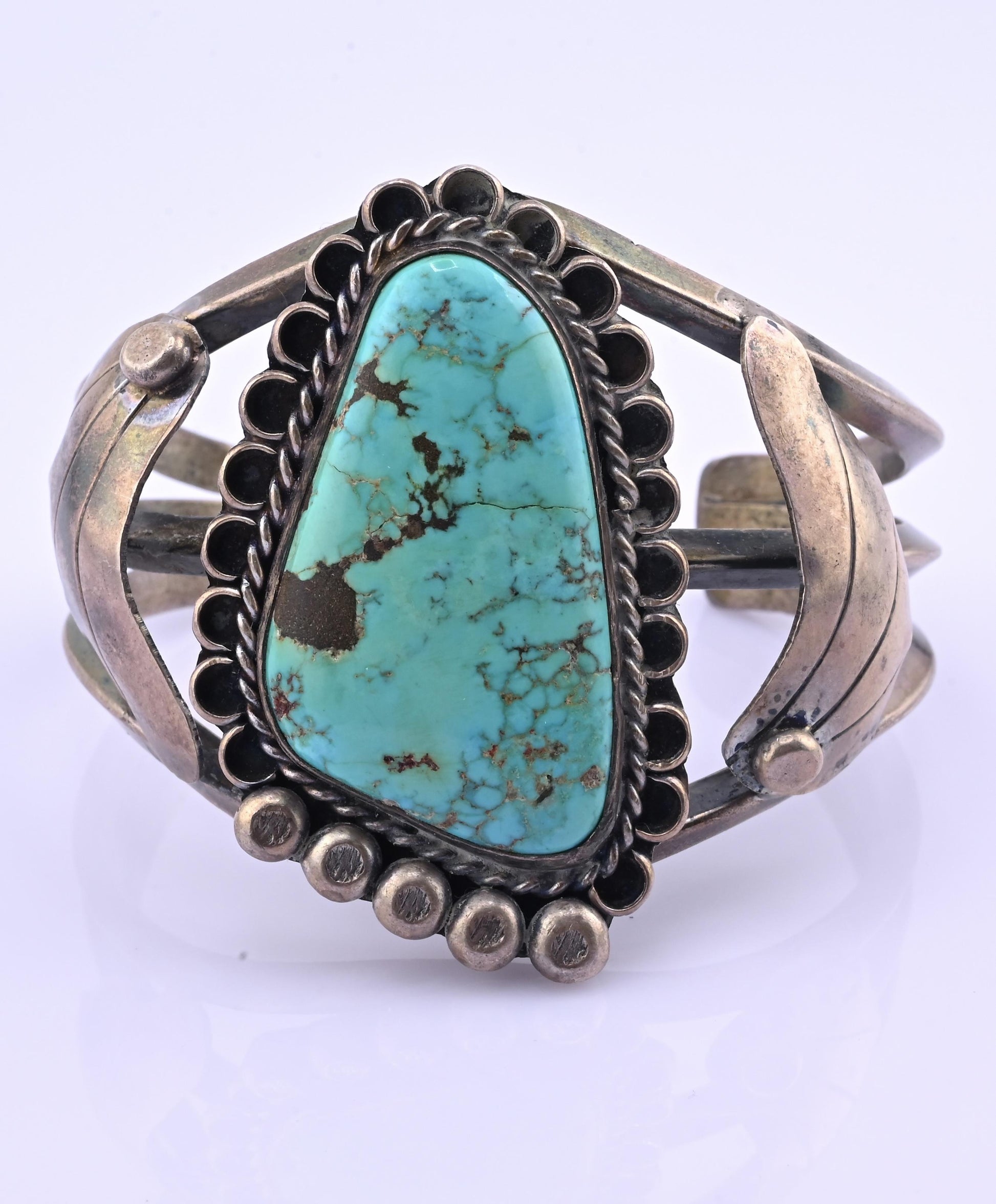 Navajo Sterling Silver and Graduated Turquoise Row Cuff