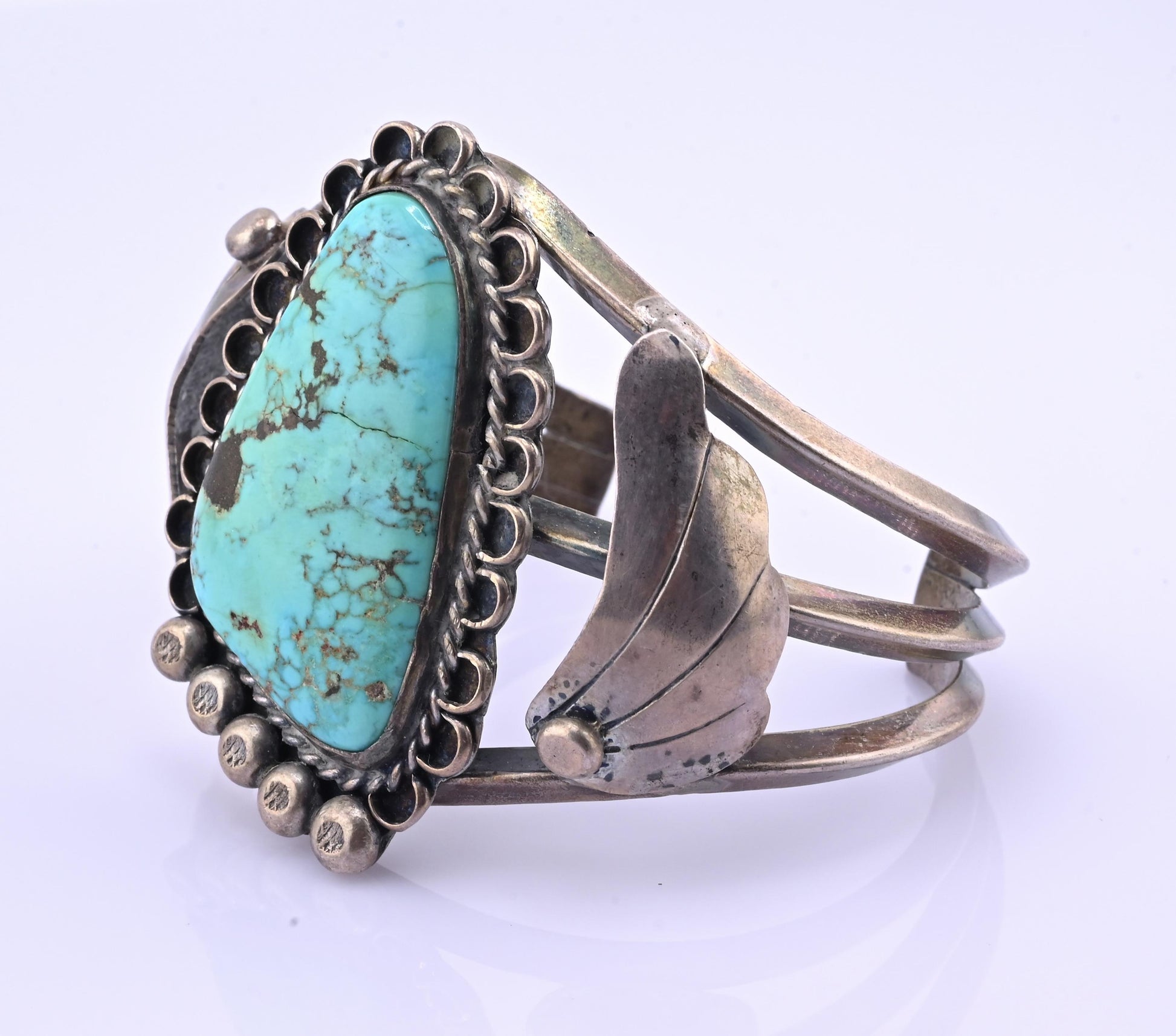 Navajo Sterling Silver and Graduated Turquoise Row Cuff