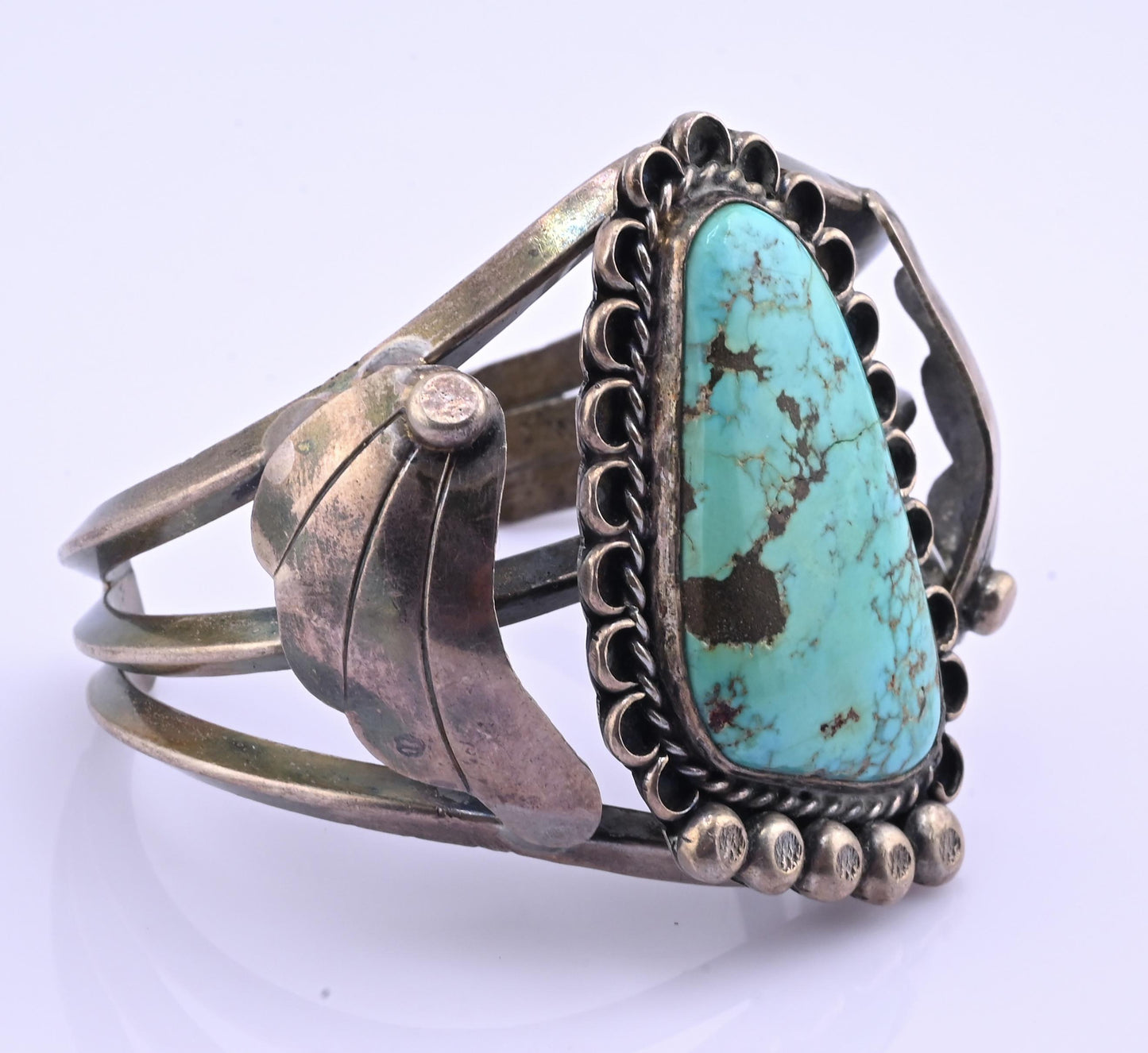 Navajo Sterling Silver and Graduated Turquoise Row Cuff