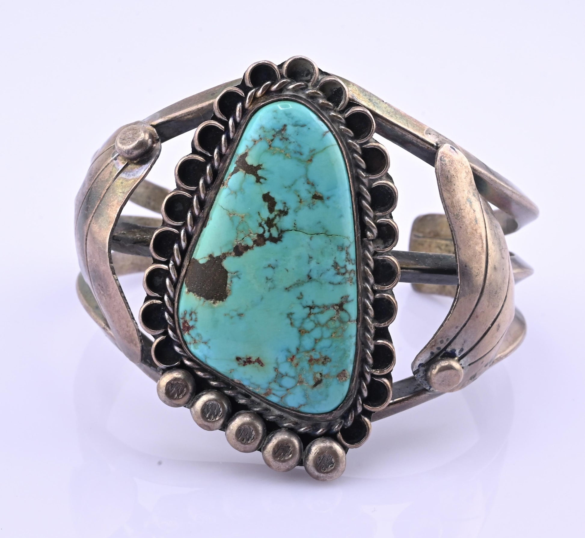 Navajo Sterling Silver and Graduated Turquoise Row Cuff