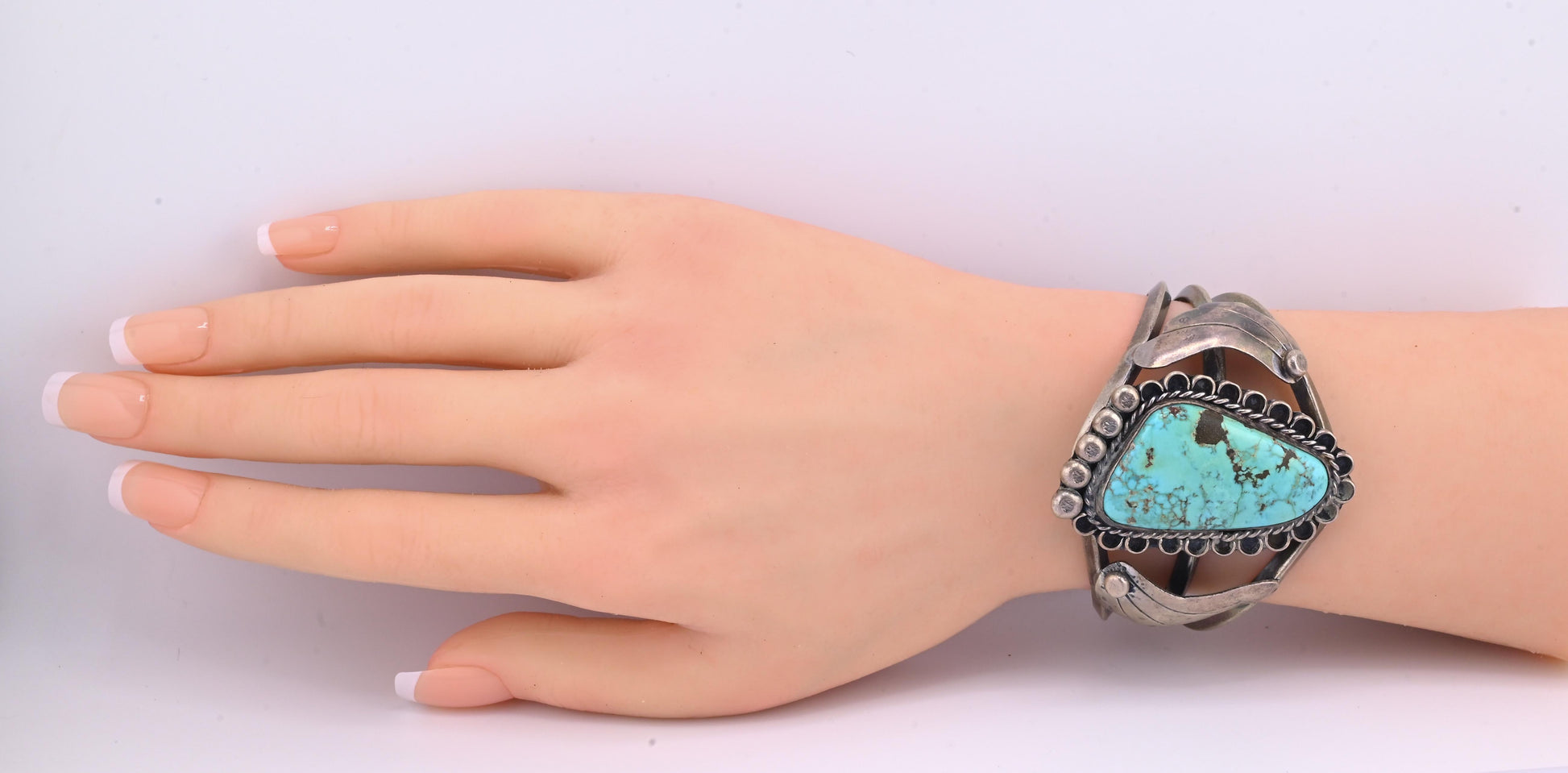 Navajo Sterling Silver and Graduated Turquoise Row Cuff