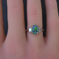 Custom Platinum 1.20ct Black Opal & Baguette Diamond Three-Stone Ring