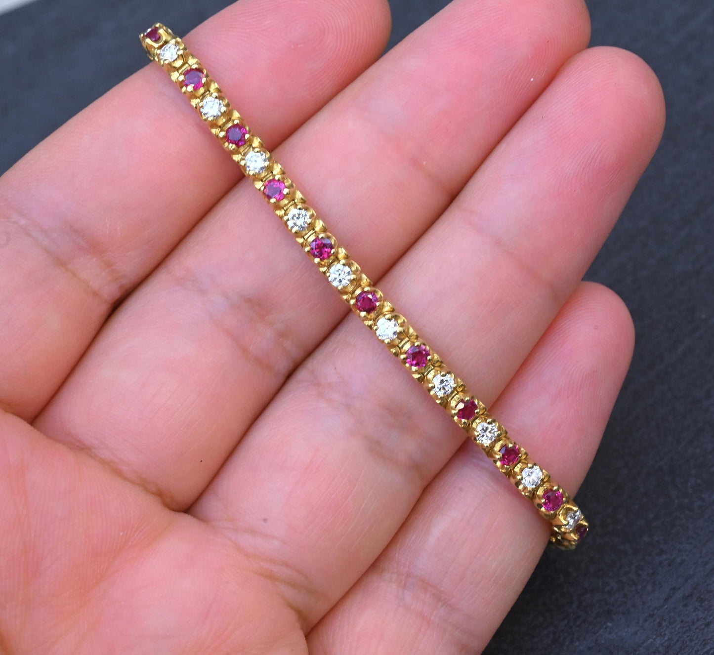 3.05 TCW Ruby & Diamond Tennis Bracelet in 18K Yellow Gold – 7" – IGI Certified