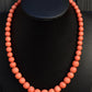 Japanese Momo Coral Bead Necklace with 14K Gold Clasp – 17.5”, 51.15g