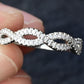 Platinum Diamond Infinity Twist Band – 0.12–0.15ct Total, Size 6.5