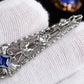 Art Deco Brooch in 14K White Gold with Blue Sapphire & Diamonds IGI Certified