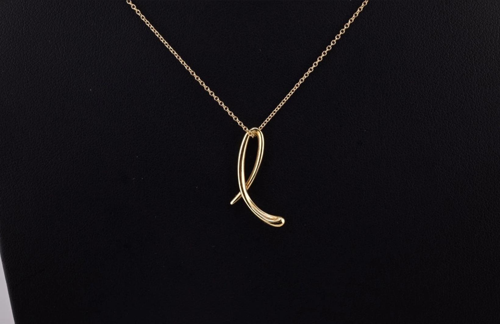 Fantastic Elsa Peretti Tiffany & Co. Yellow Gold Cursive L Pendant