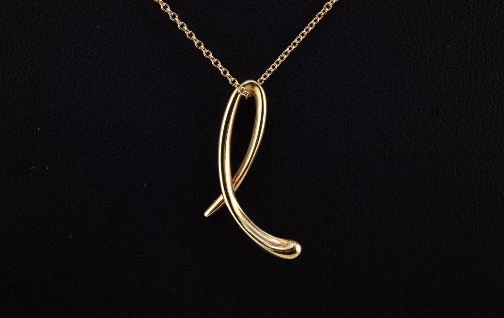 Fantastic Elsa Peretti Tiffany & Co. Yellow Gold Cursive L Pendant