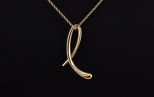 Fantastic Elsa Peretti Tiffany & Co. Yellow Gold Cursive L Pendant