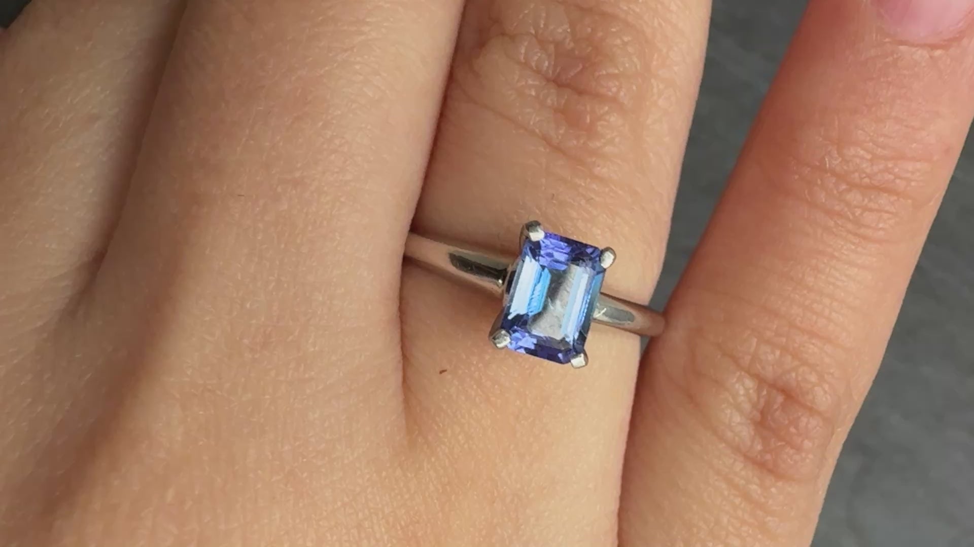 Elegant Platinum Emerald-Cut Tanzanite Solitaire Ring – 0.70 Carats Size 6